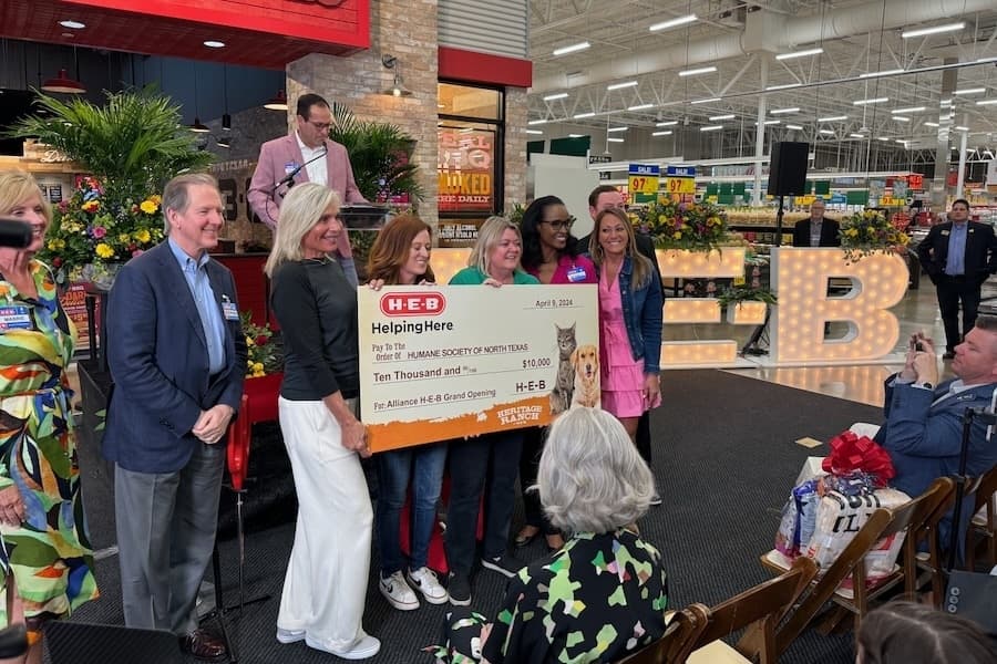 Two $10,000 donations were made at the April 9 ribbon-cutting ceremony of the H-E-B in north Fort Worth. (Mark Fadden/Community Impact)