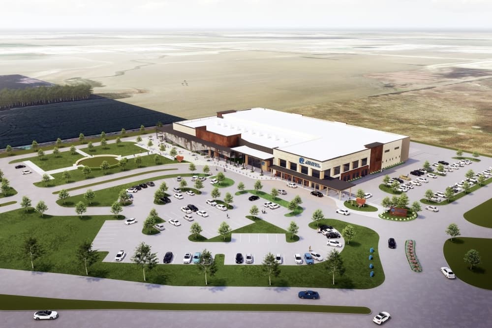 a rendering of a large building with a parking lot