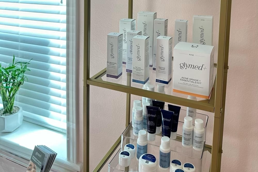 A shelf with skincare products is shown.