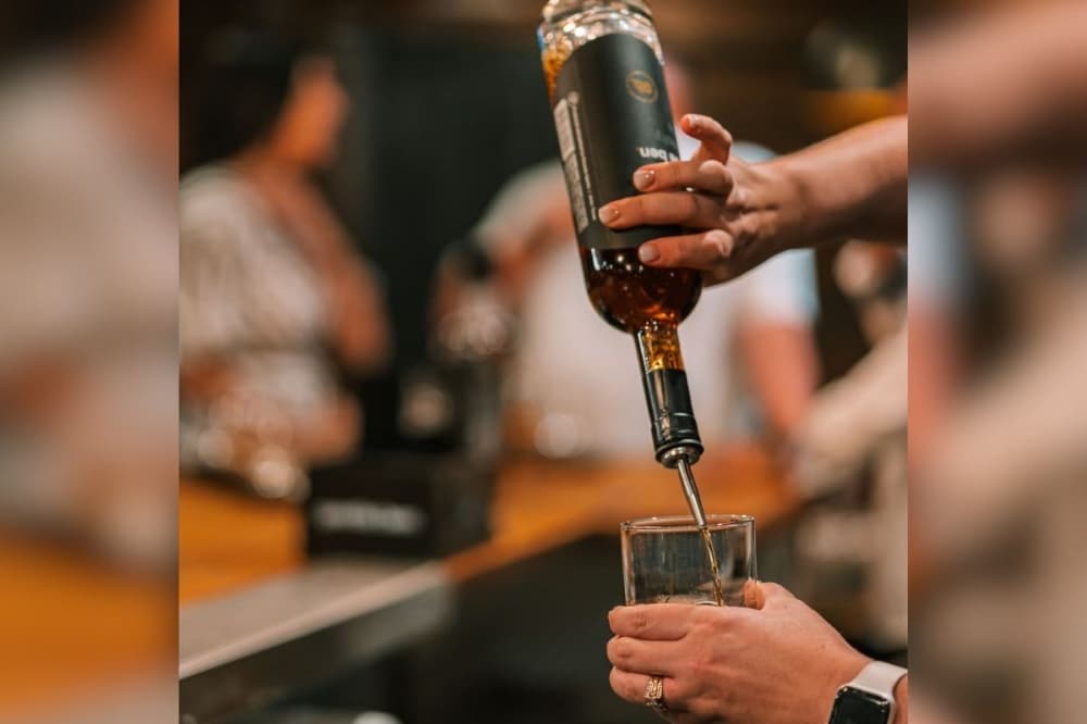 gentle ben pouring whiskey