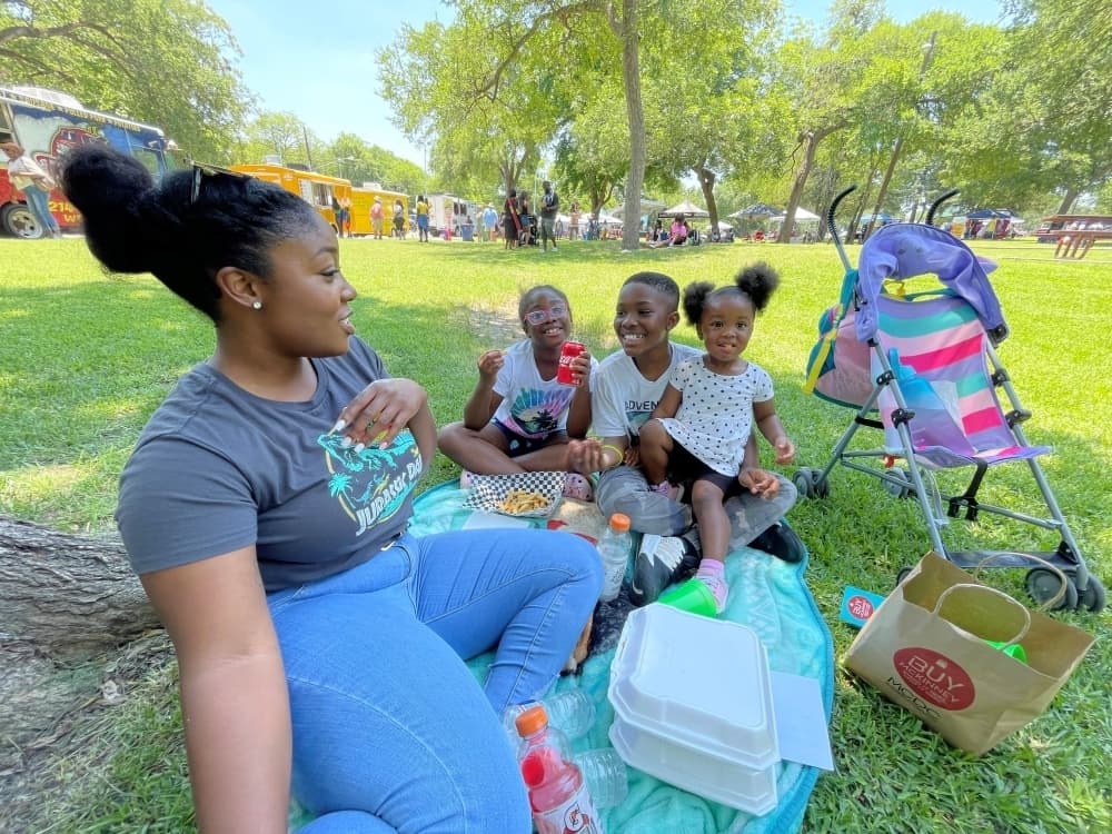 A family enjoys McKinney's Juneteenth celebration. 
