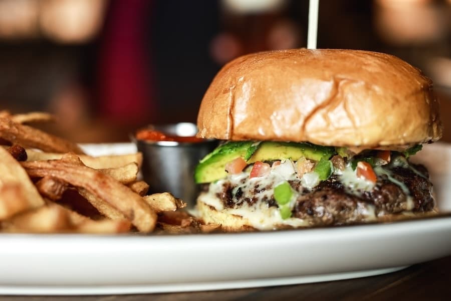 photo of burger with fries