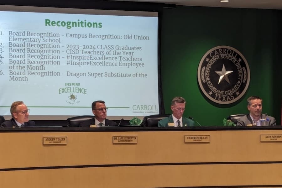 CISD trustees sit at the dias 