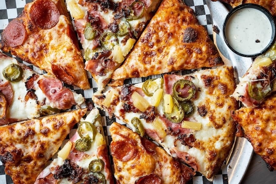 The Curry Pizza Company opens first Texas location in Cypress