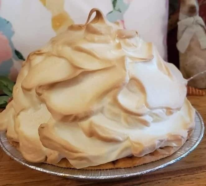 Pie with topped with tall meringue. 