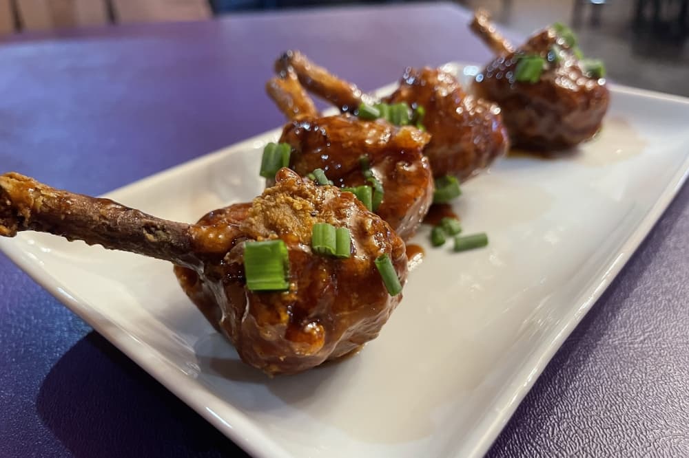 As an appetizer, patrons can order the lollipop chicken bourbon. (Grant Crawford/Community Impact)