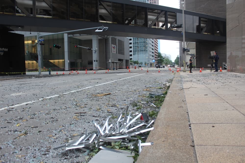 Windows were blown out of a second-floor walkway connecting buildings at the Dallas and Louisiana street intersections, at a Centerpoint Energy building. (Shawn Arrajj/Community Impact)