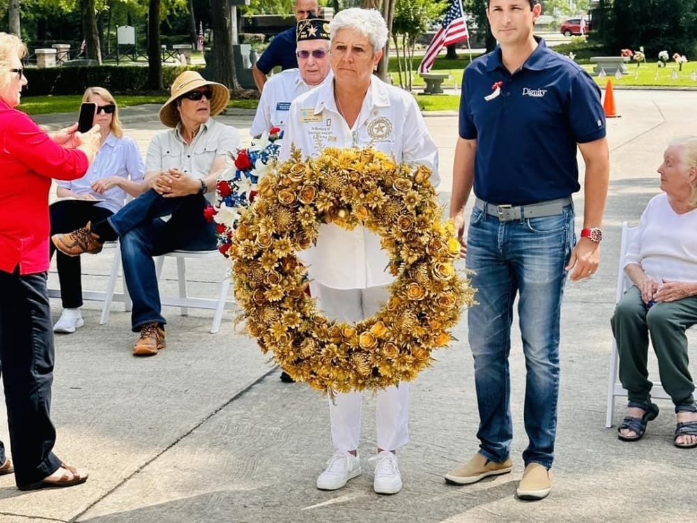 A wreath ceremony at a cemetery