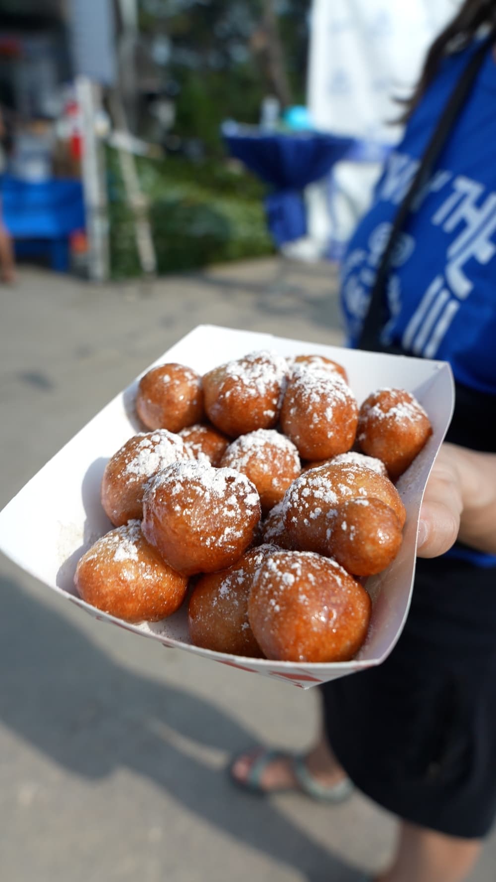 fried dough balls with powdered sugar 