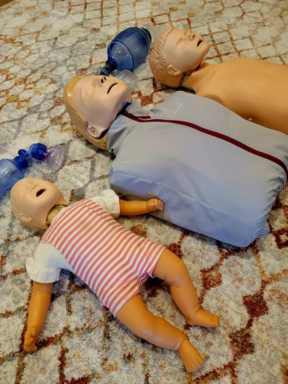 Training mannequins lying on floor