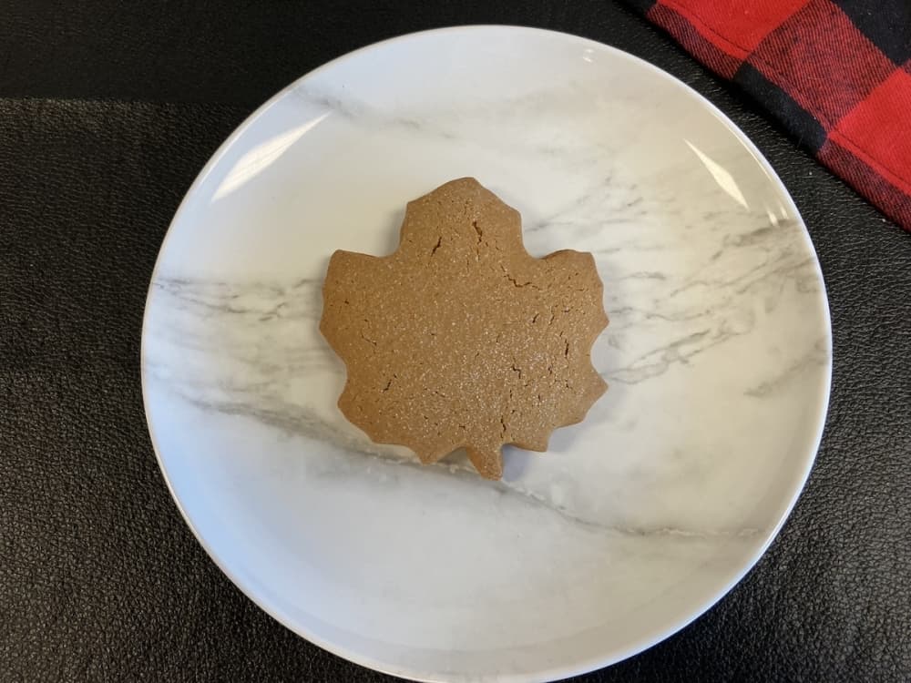 Image shows a maple leaf-shaped cookie.