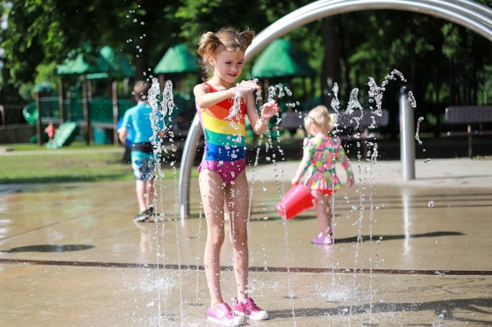Young girl at a splash pad