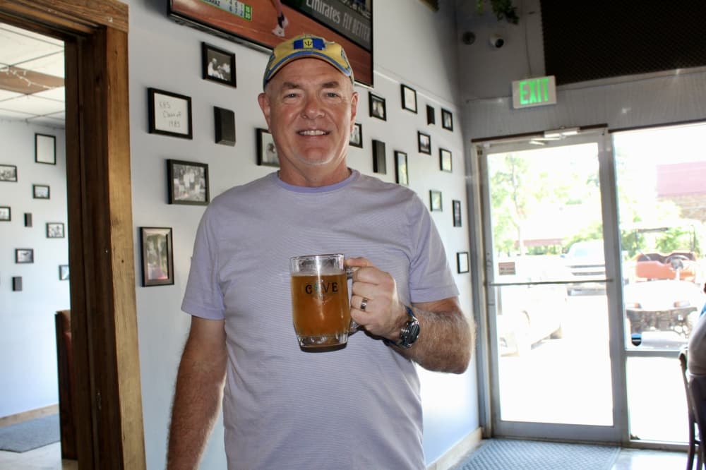 owner with beer