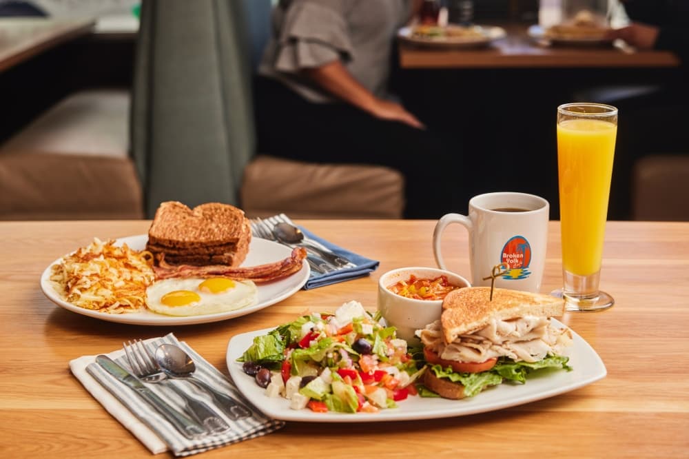 sandwich and breakfast on plates