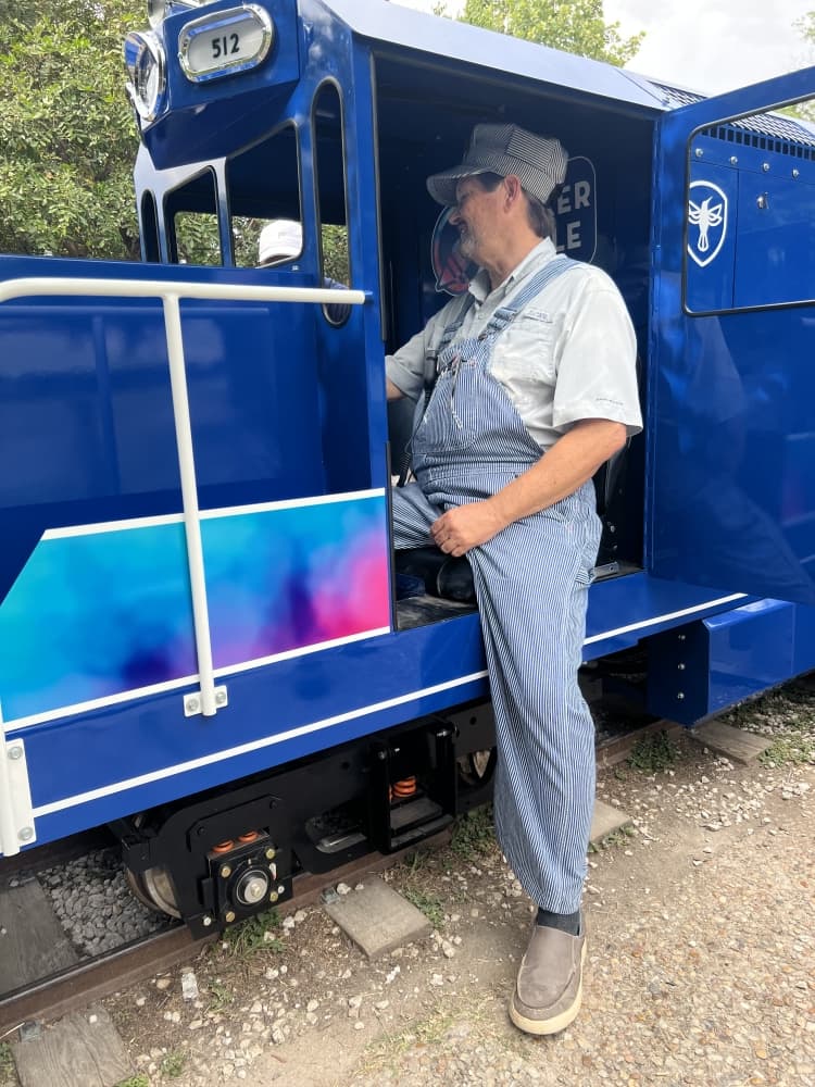The Zilker Eagle train conductor prepares for a ride. (Zacharia Washington/Community Impact)