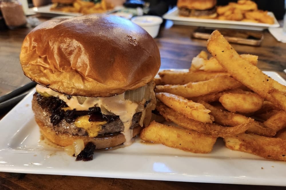 Along with steaks, The Forge 1912 offered sandwiches such as the Forge Burger with cheddar cheese and bacon jam. (Courtesy The Forge 1912)