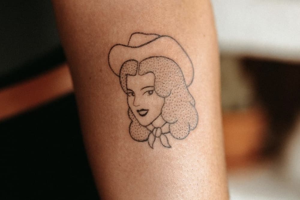 Image shows a hand poke tattoo
