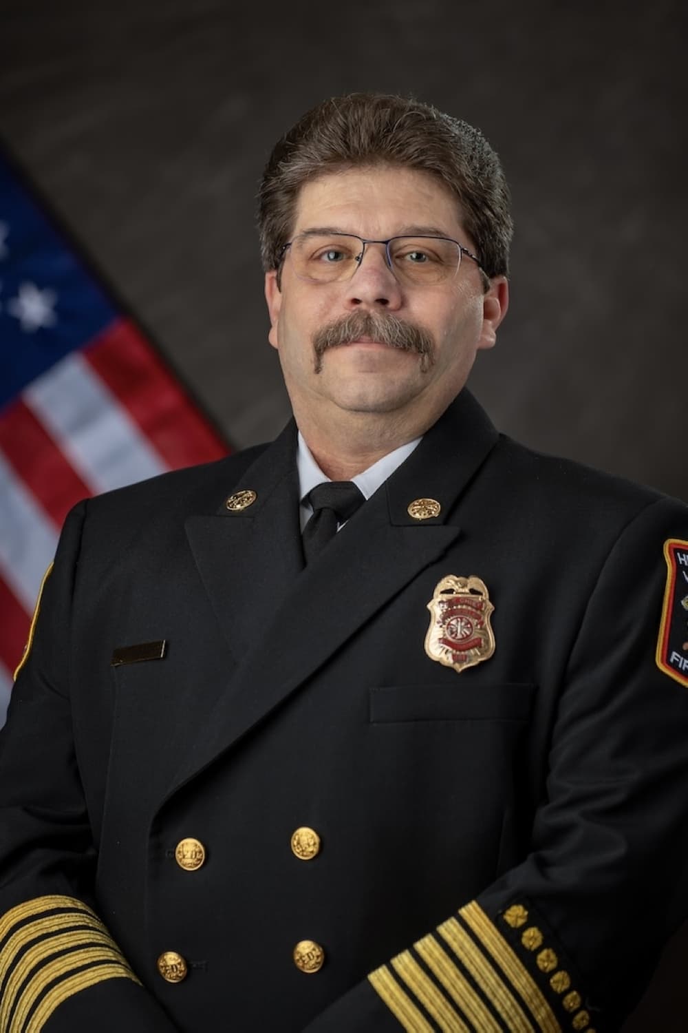 Picture of a man in his fire officer uniform