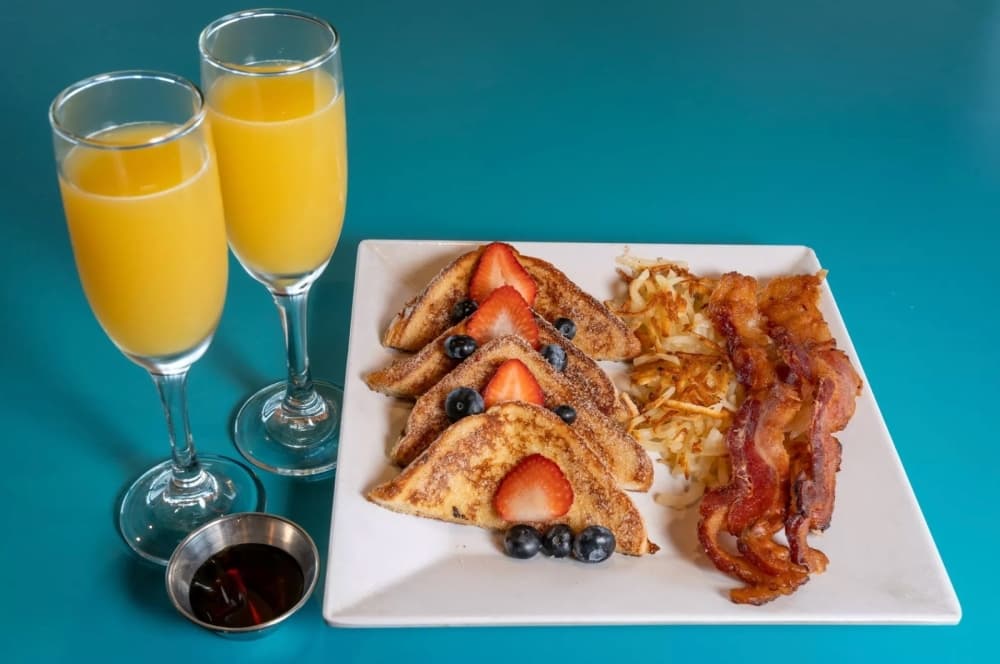 french toast, hash browns, bacon and mimosas