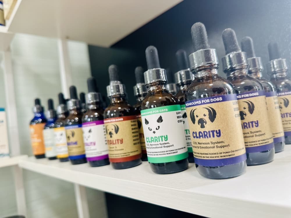 A shelf holds a variety of tinctures.