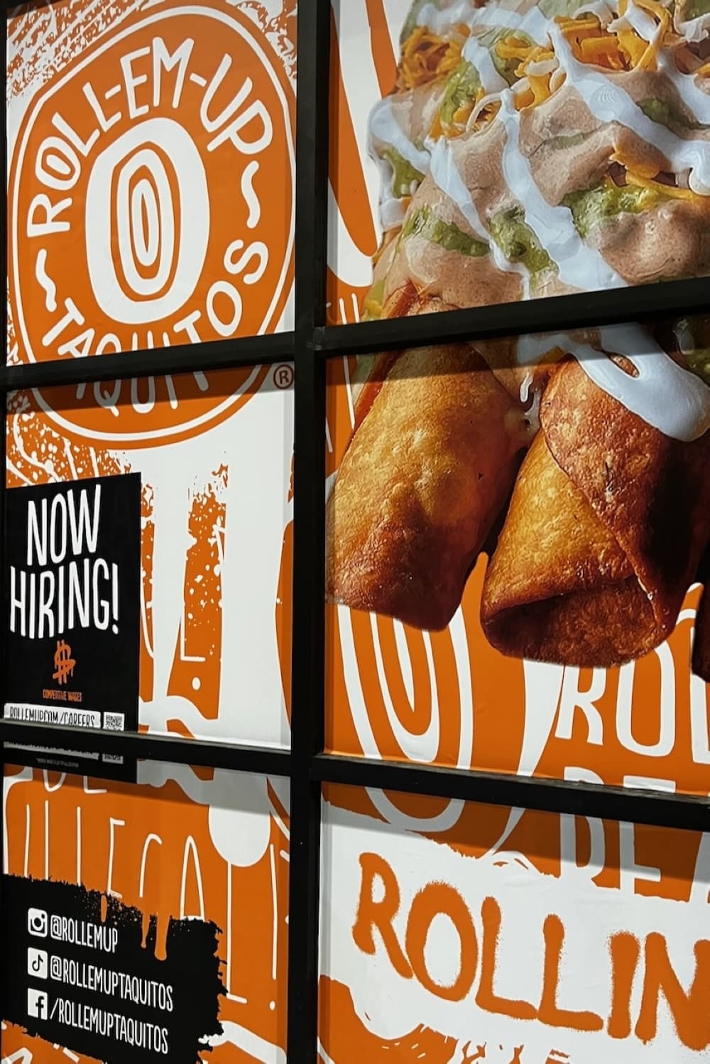 Exterior shot of Roll-Em-Up Taquitos shop.