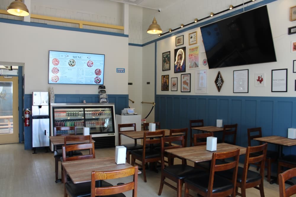 Sylvia Pizza has indoor seating with an upstairs and main floor plus outdoor seating. (Sarah Hernandez/Community Impact)