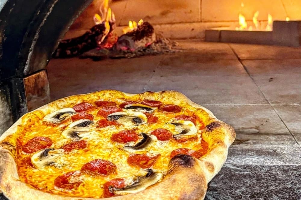 Bellissima's menu features wood-fired pizzas cooked in a stone oven. (Courtesy Bellissima)