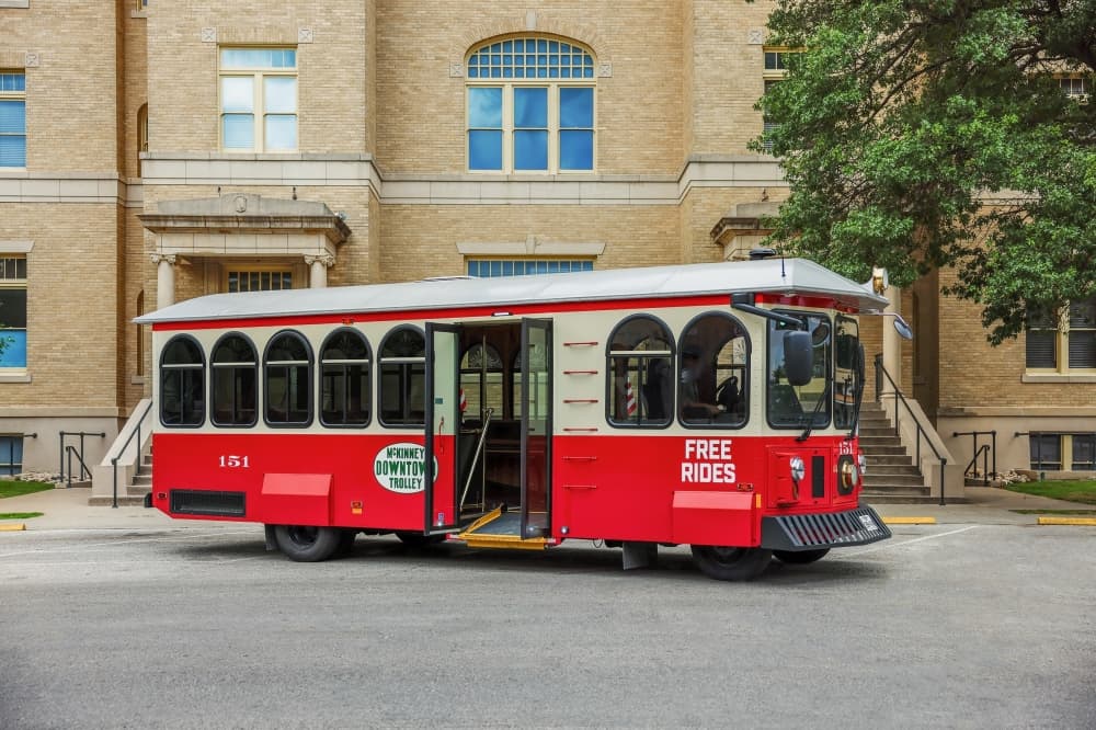 Exterior of the trolley parked in front of the McKinney Performing Arts Center