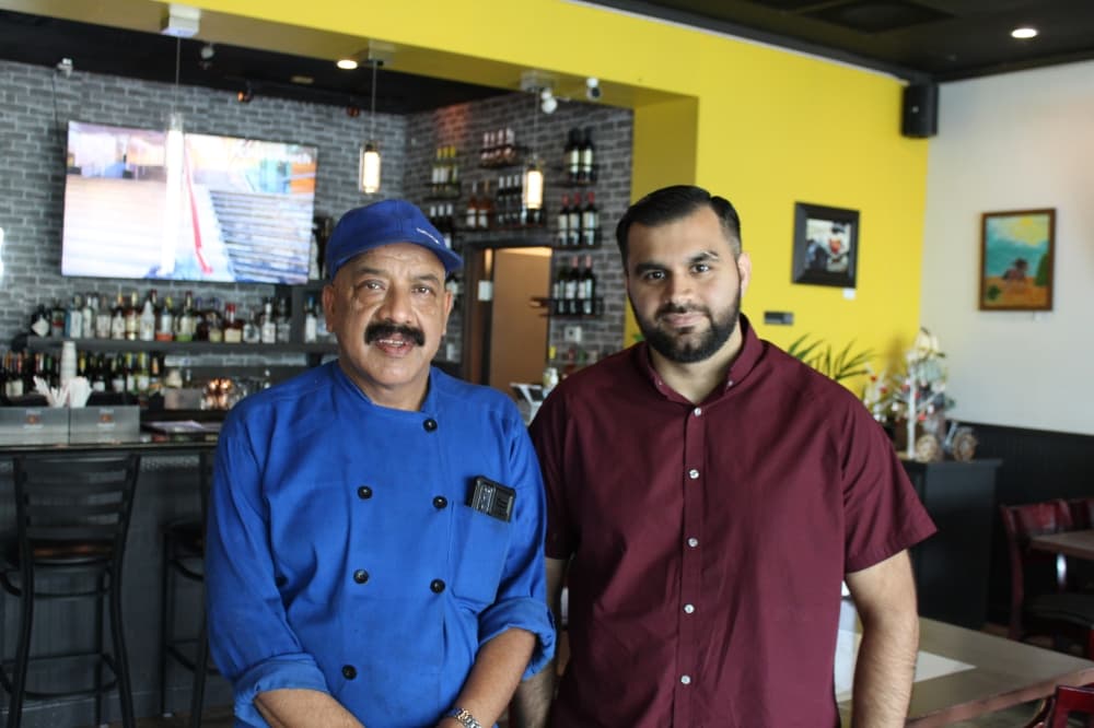 Thaman Adhikari (left) is the head chef at Tandoori Lounge, and Hamza Ashraf is one of the owners. (Sarah Hernandez/Community Impact)