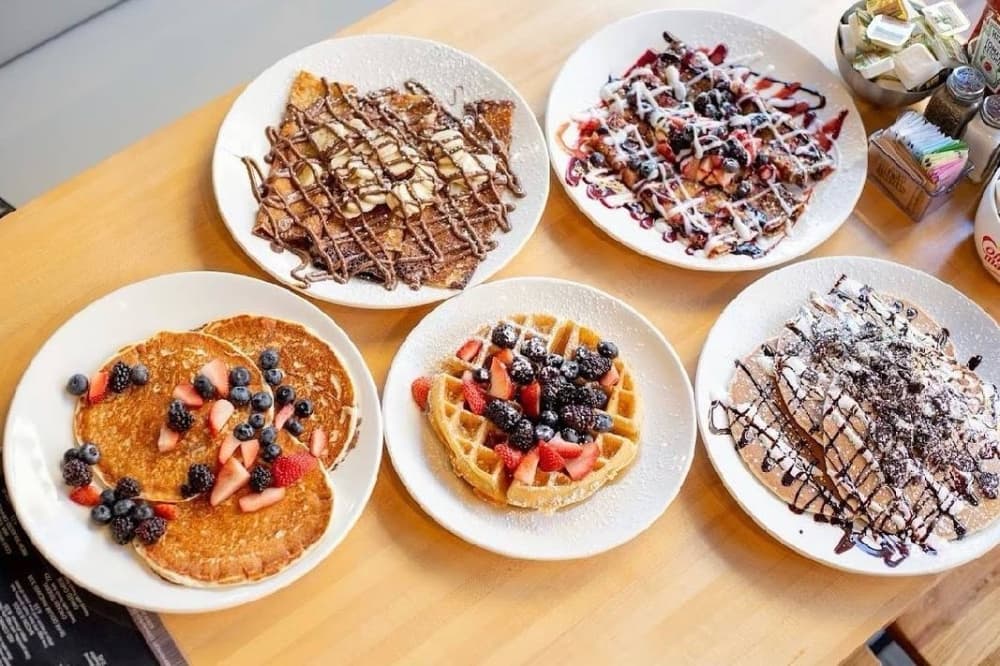 Several breakfast plates from Jam + Toast. 
