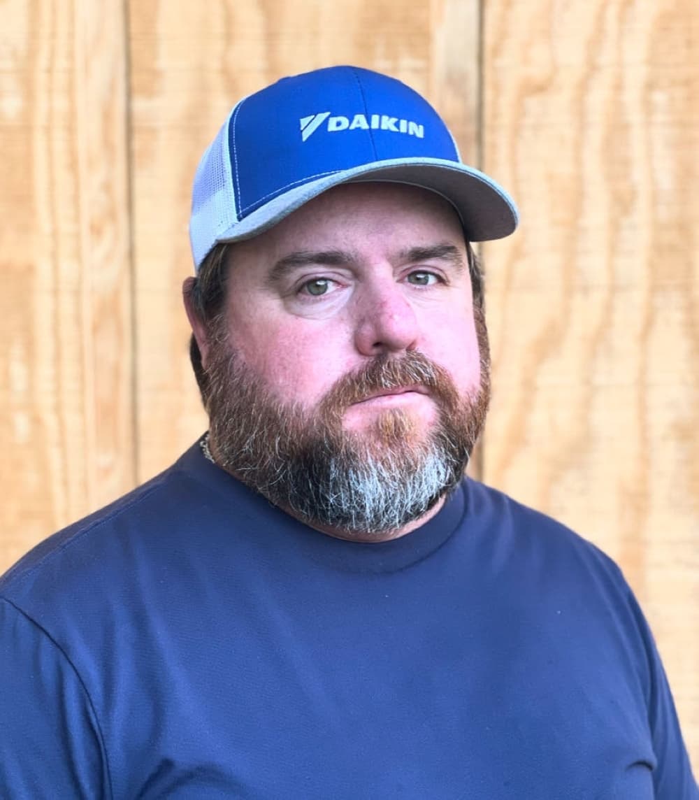 A headshot of owner Eddy Plummer.