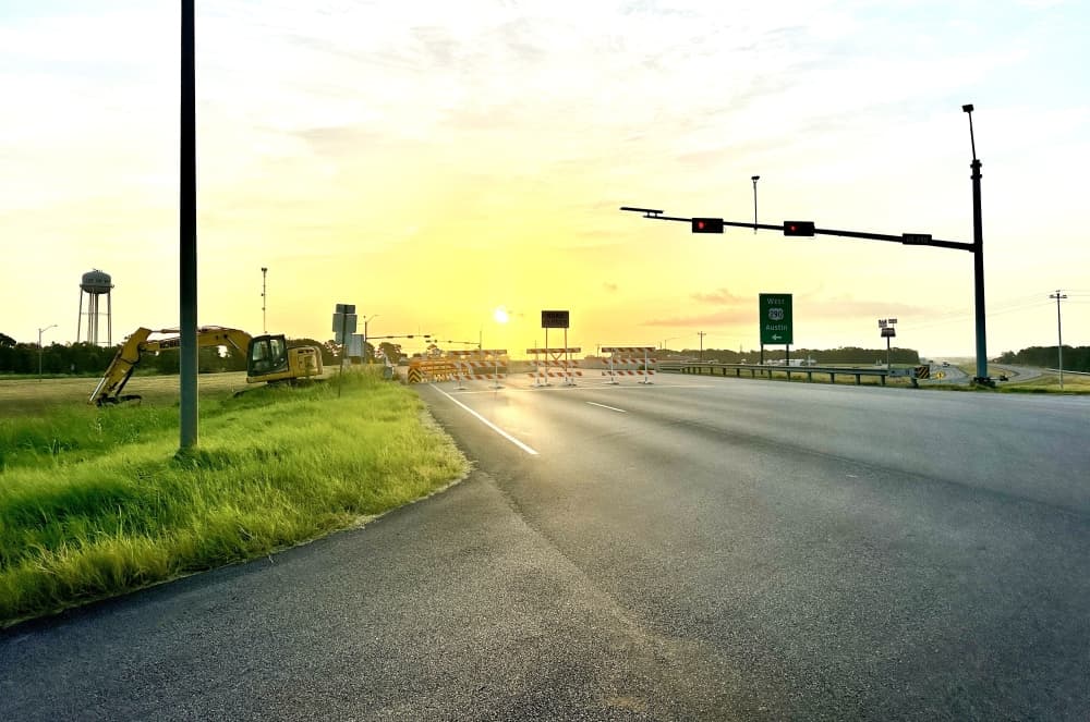 The overpass is shown with construction happening around it.
