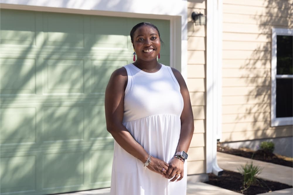An image of a homeowner who participated in the Austin Habitat home-building program. 