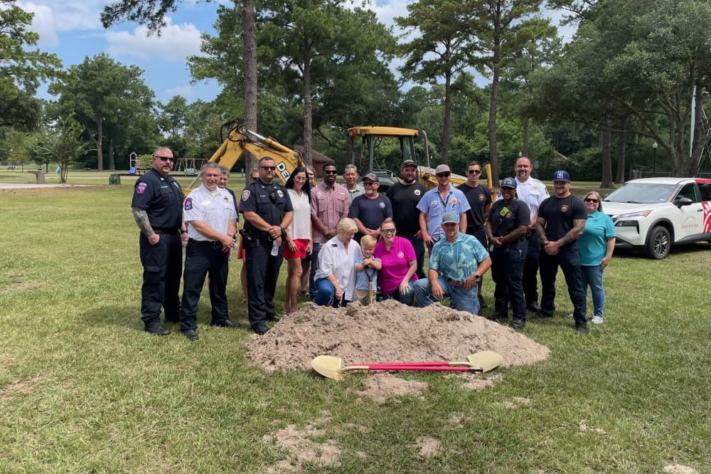 Louie Munson and Tomball officials at Louie's Together Playground.