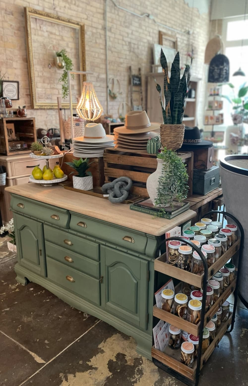Items at the showroom/shop are shown.