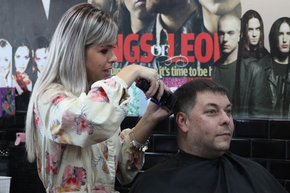 Barber cutting hair
