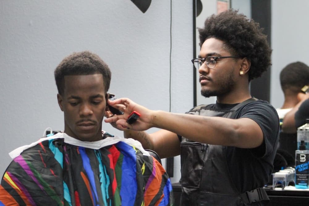 Nick Gibson cutting hair