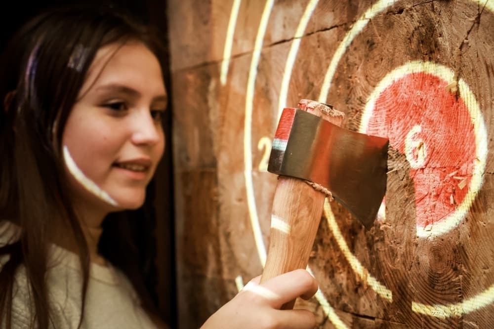 girl axe throwing