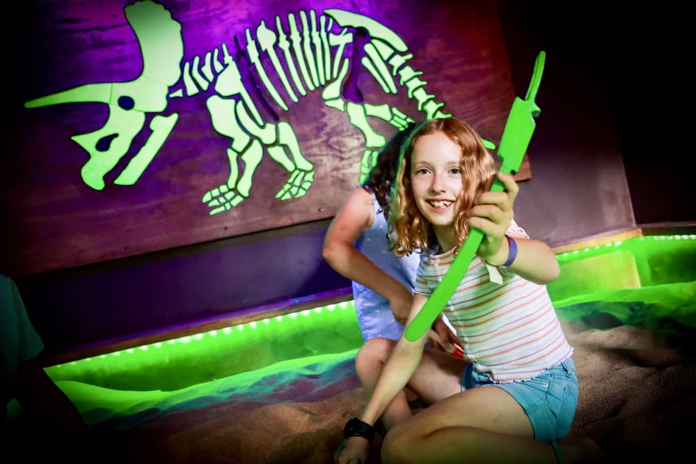 kid with toy fossils 