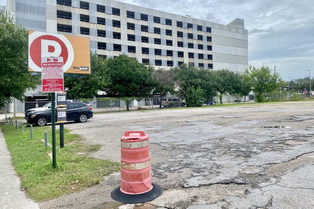 The entrance to an empty parking lot