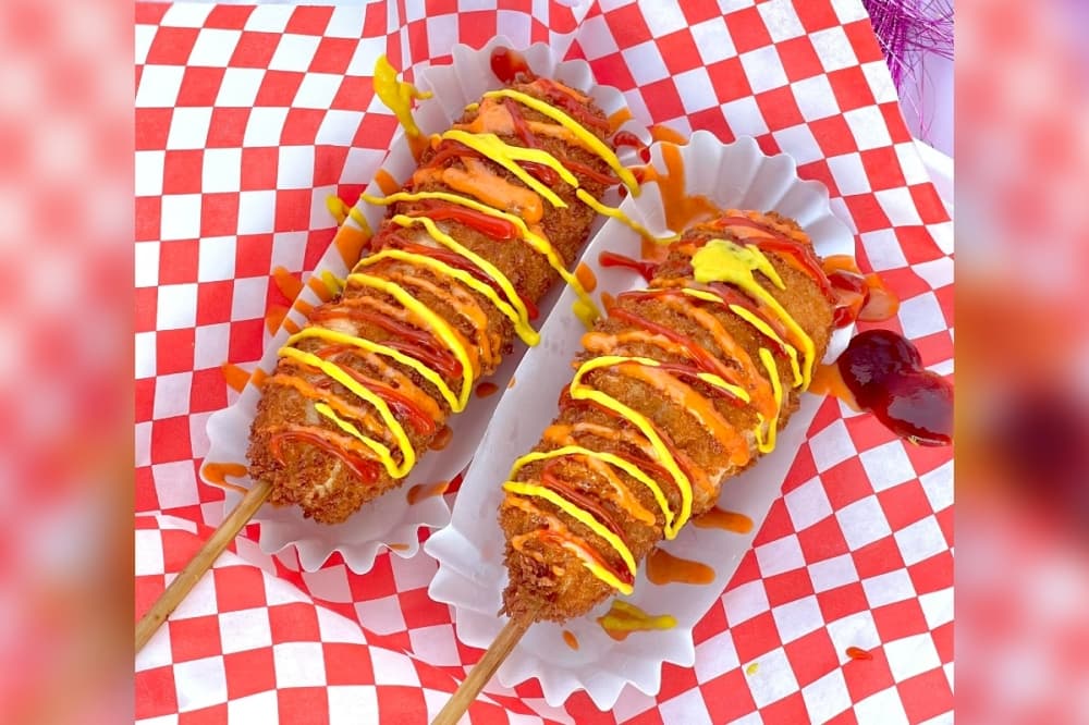 Photo shows Korean corn dogs.