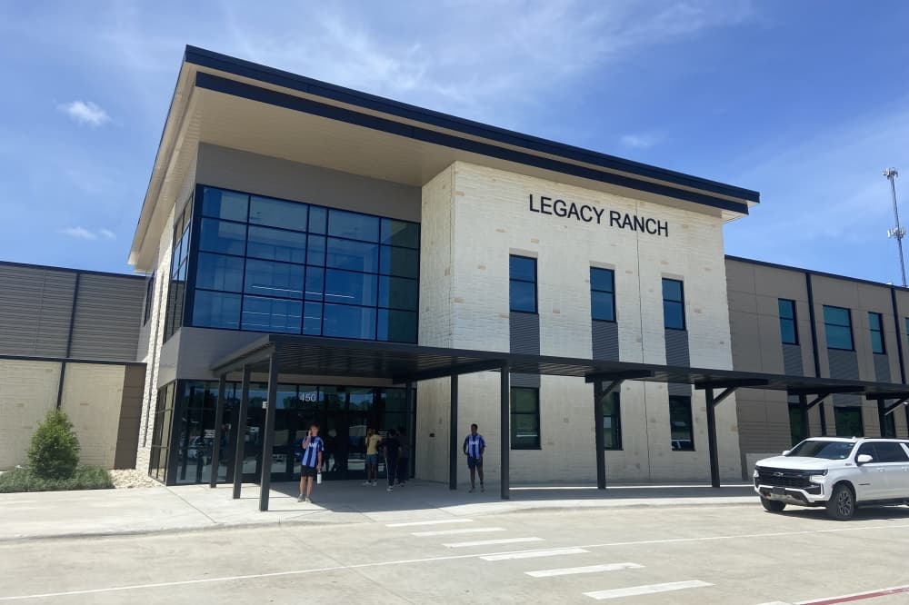 A building that says "Legacy Ranch"