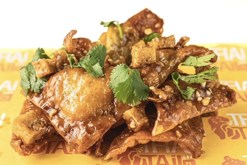 closeup photo of a pile of crispy wontons
