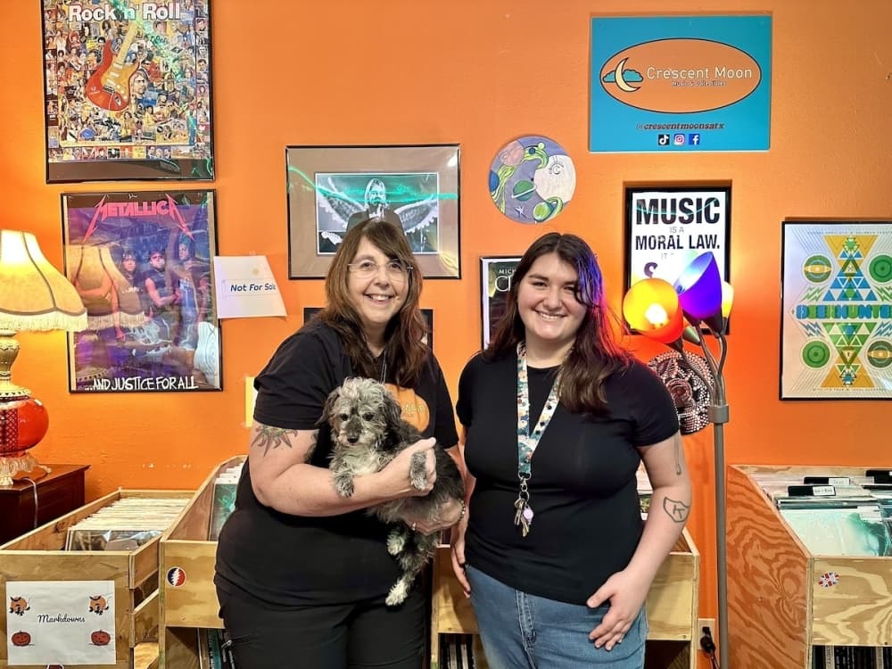 Photo shows owners of Crescent Moon shop.