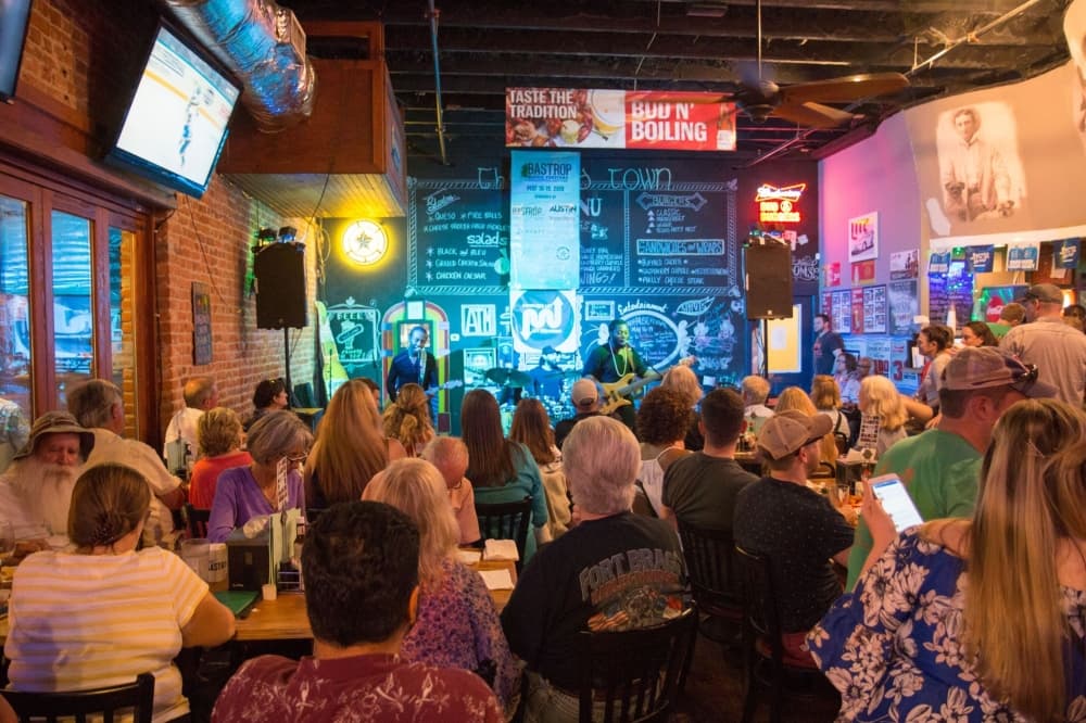 An image of a crowd at a concert from a previous Bastrop Music Festival.