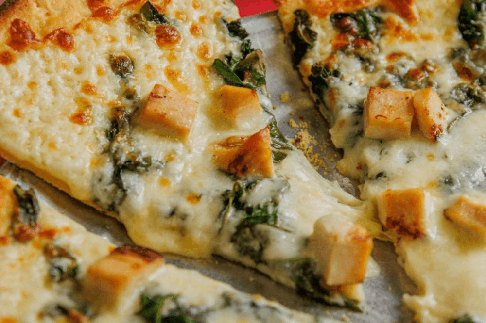 Image of. chicken and spinach pizza at Leo's. 