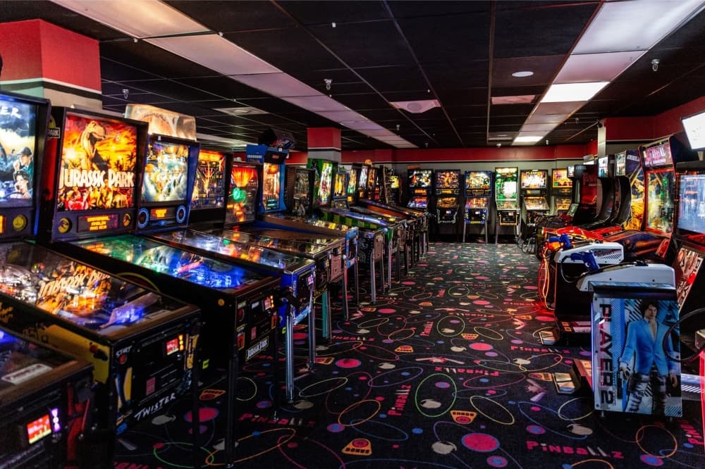 An image of the interior of The Original Pinballz Arcade. 