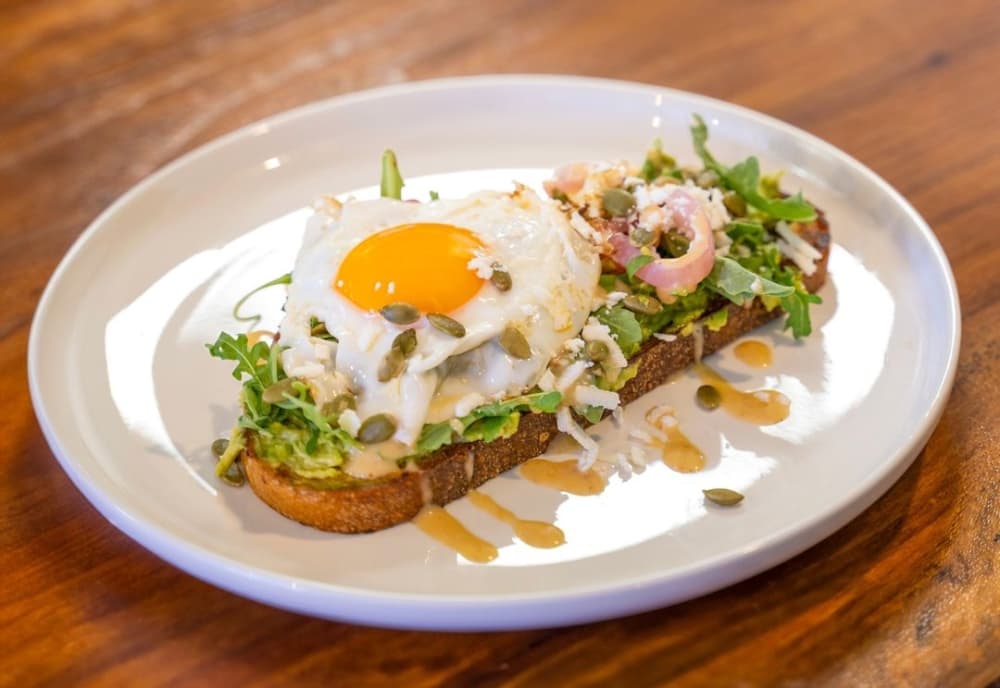 Breakfast options include avocado toast, chilaquiles, migas plates and more. (Courtesy Pepita's Cafe & Bar)