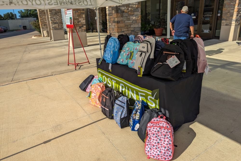 Table with backpacks