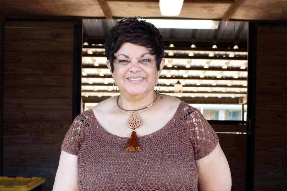 Female smiling for a picture. 